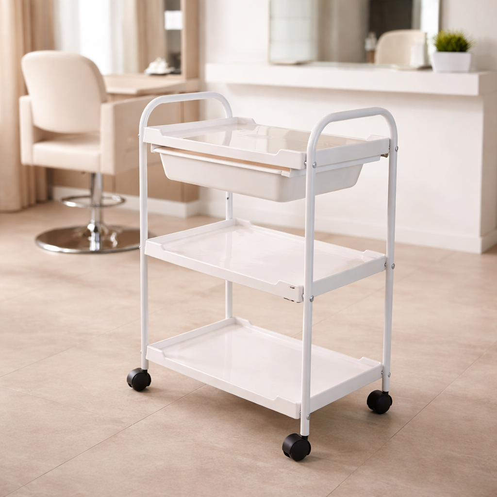 White rolling cart with three shelves in a room setting.