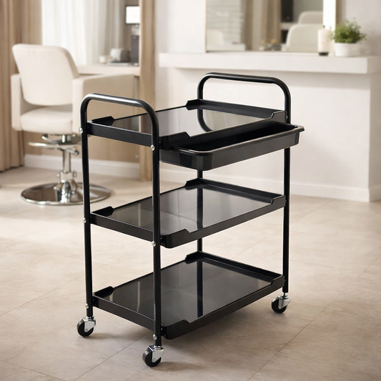 Black serving cart with three shelves in a room setting