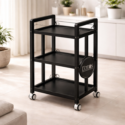 Black rolling cart with 'LOTUS' branding in a home setting