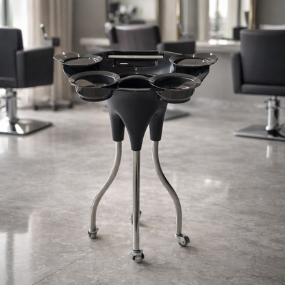 Black hair washing station with multiple basins in a salon setting