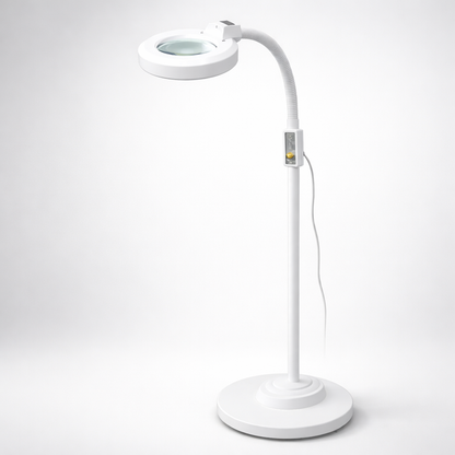 White magnifying lamp on a light gray background