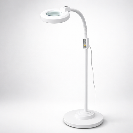 White magnifying lamp on a light gray background